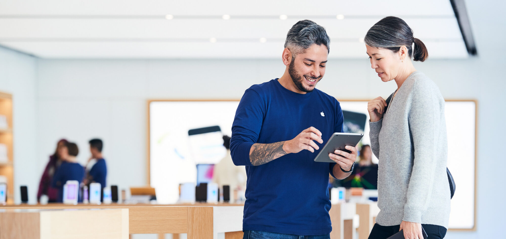 Apple doing. Apple Store. Apple Store Employee. Funny photo of Employees while working Apple. Photo for Store.