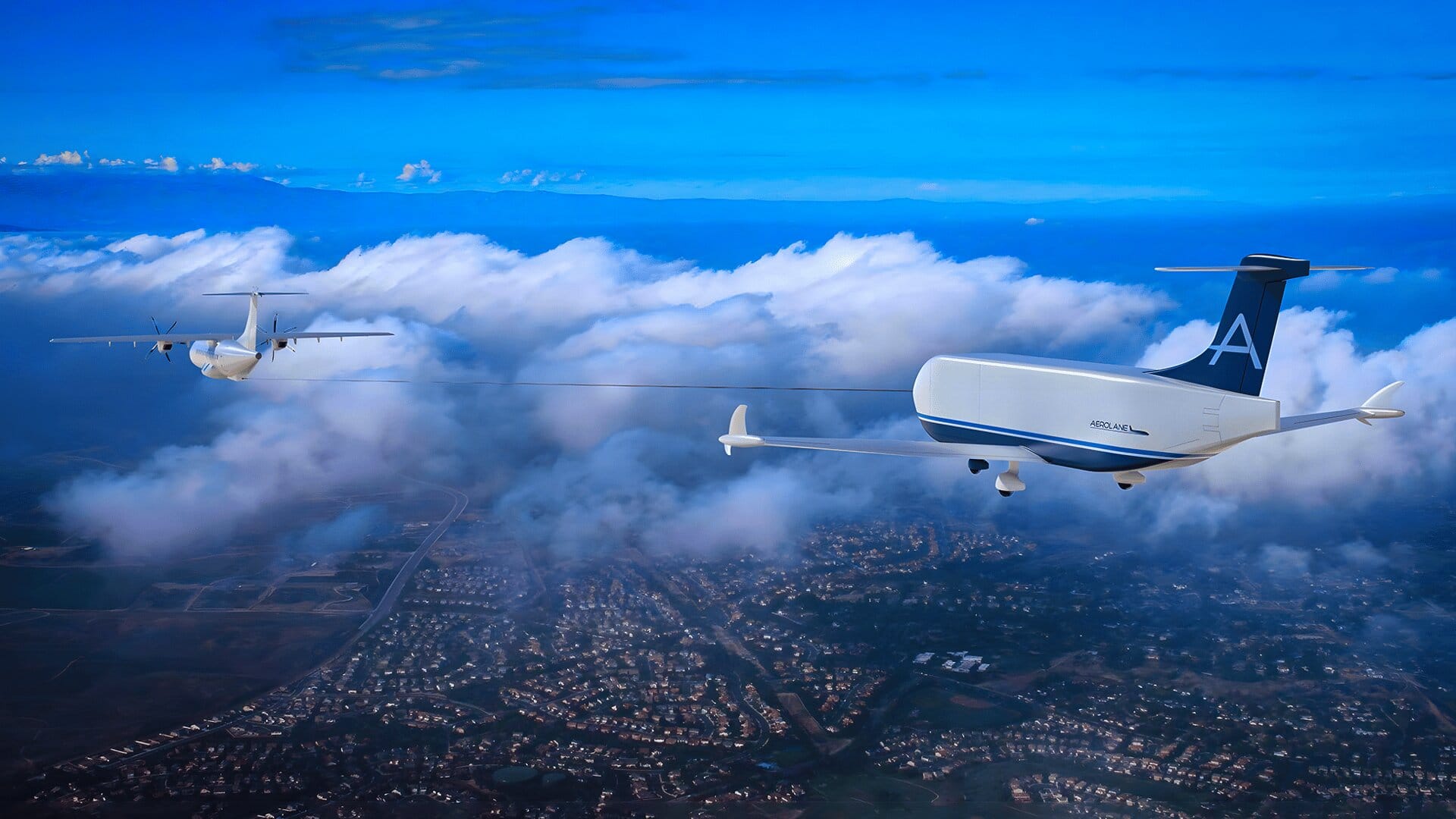Грузы по воздуху предлагают перевозить с помощью привязанных к самолётам планеров